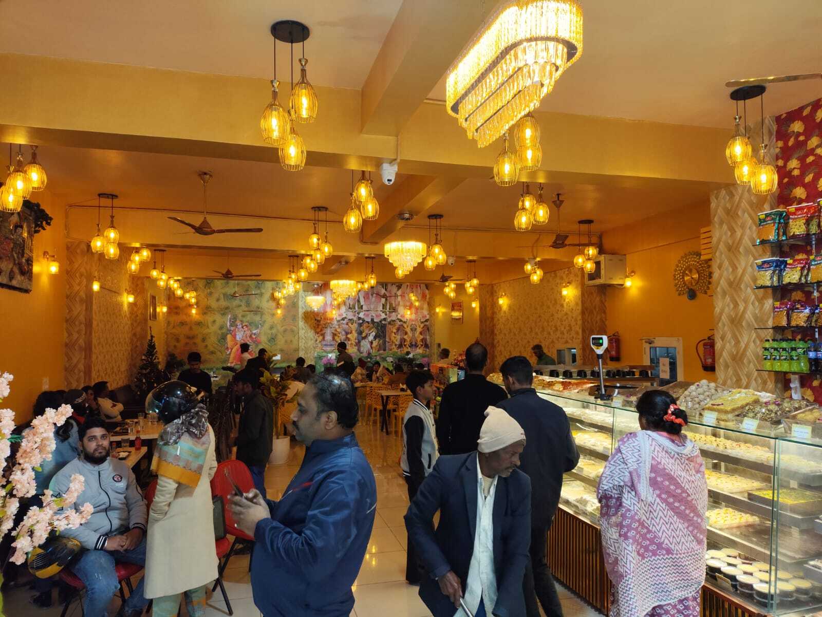 Shree Radhe Radhe Sweet Shop Interior – sweets display counter and dining area